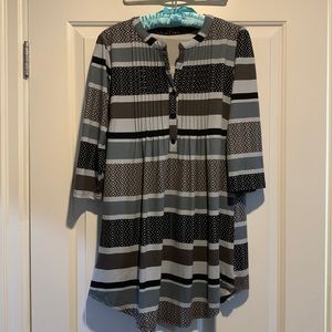 Tunic style top, with pleated front panel, hangs beautifully